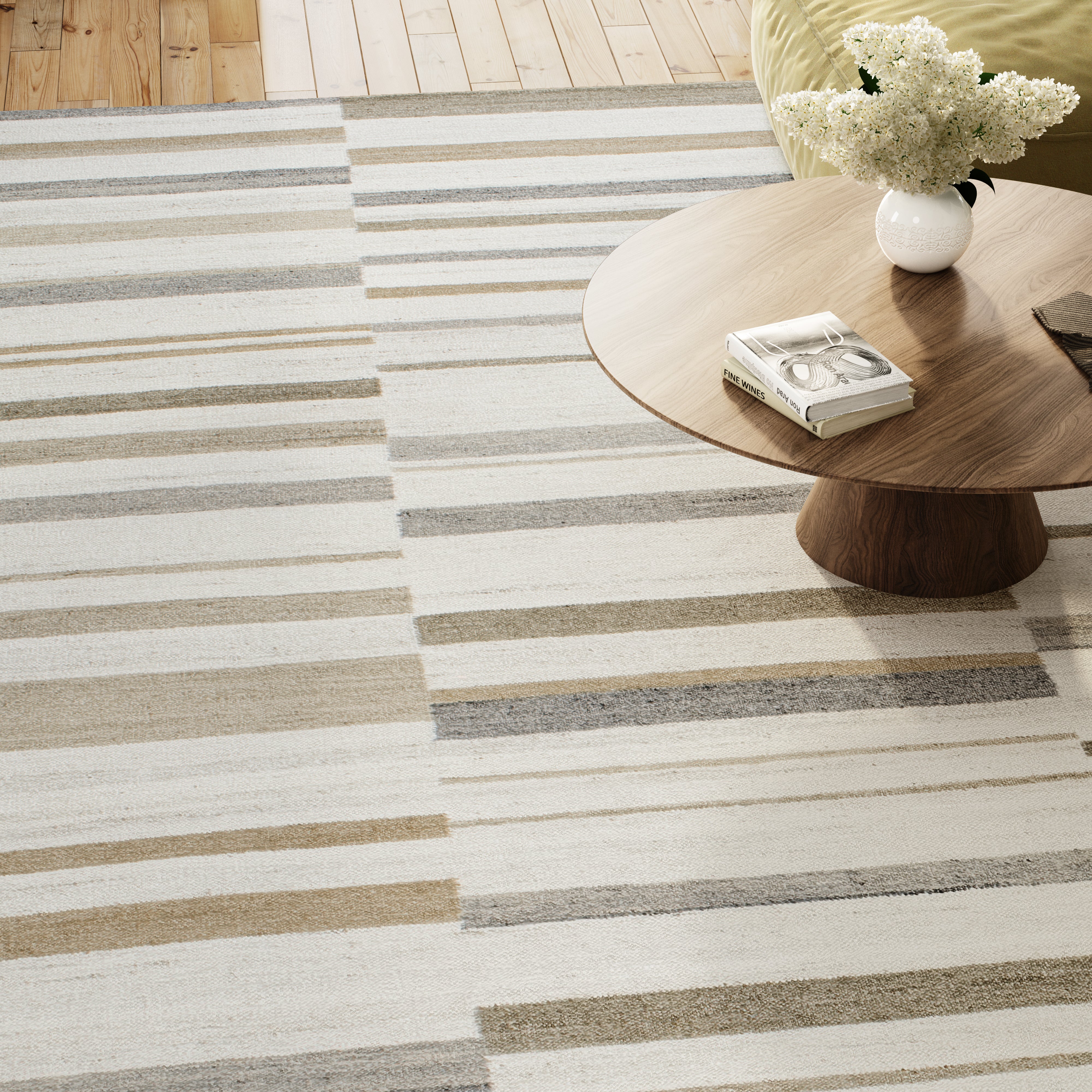 Striped rug with a wooden coffee table and decorative items in a room.