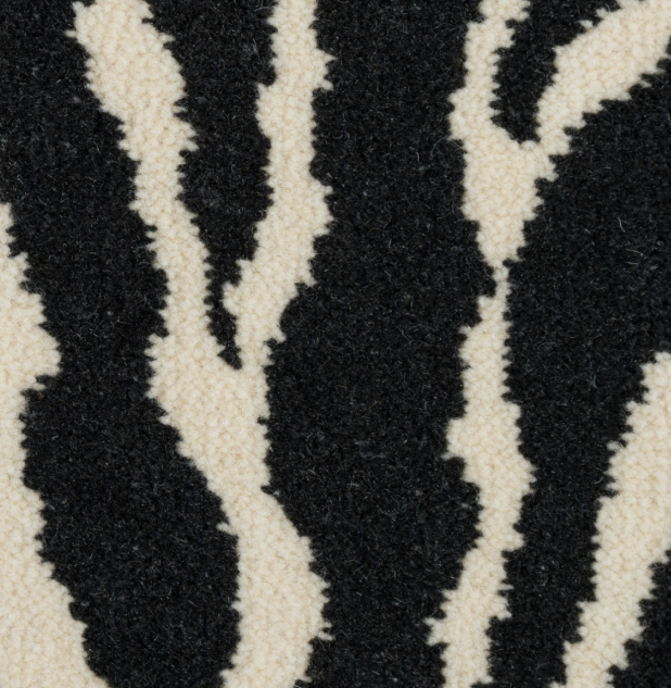 AXMINSTER example in black and white.