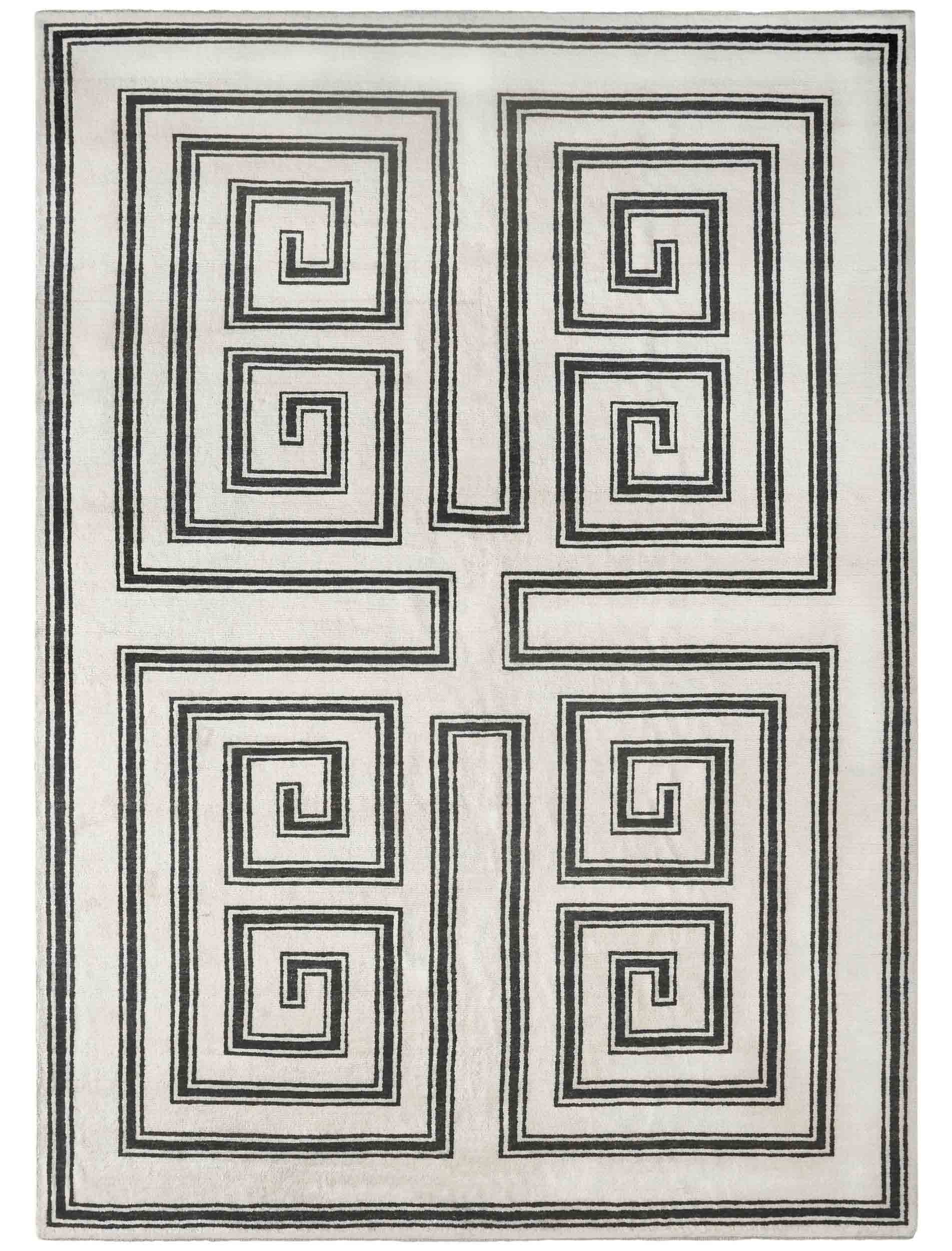 Light tan rug with dark geometric design.