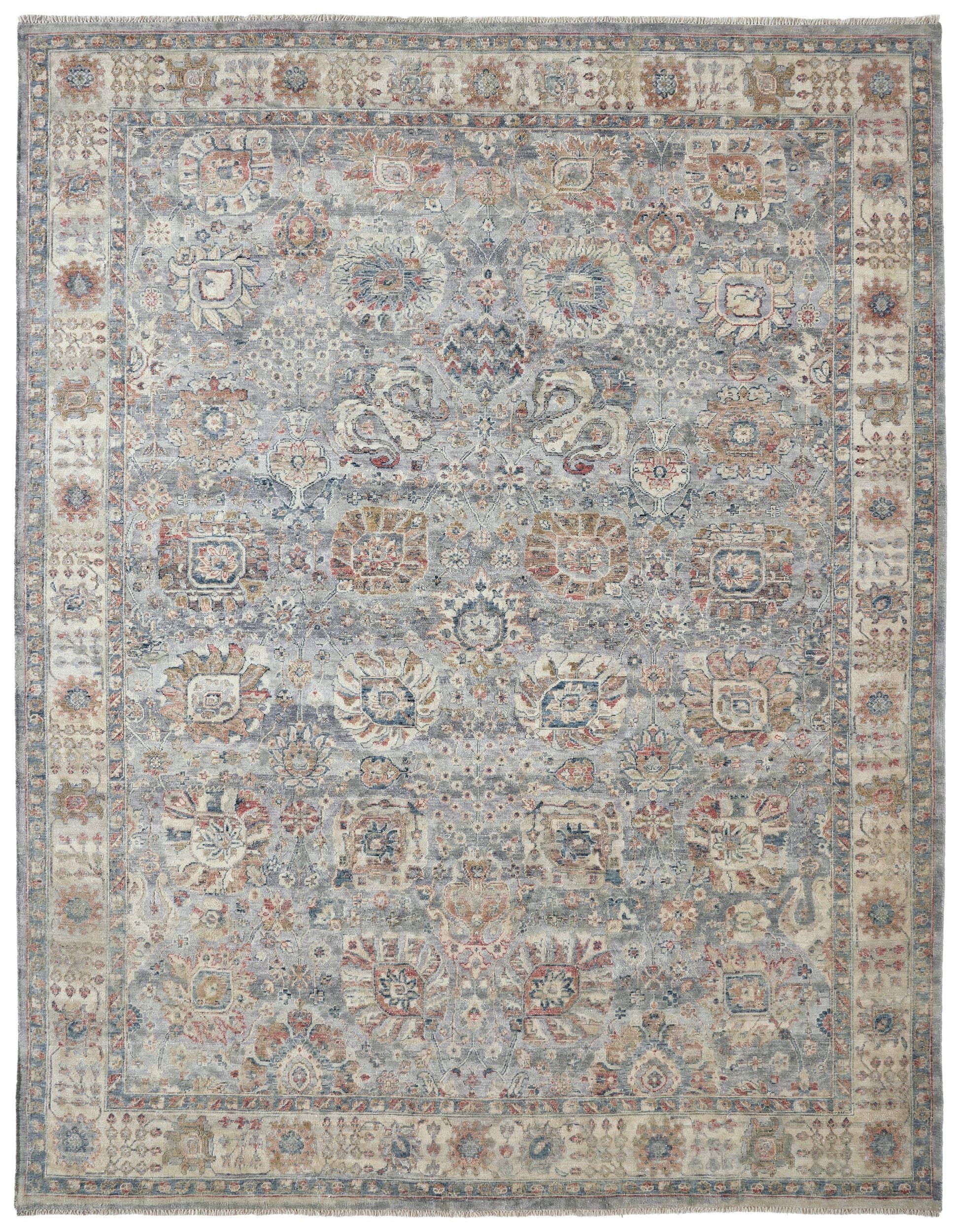 Decorative rug with a floral pattern on a plain background