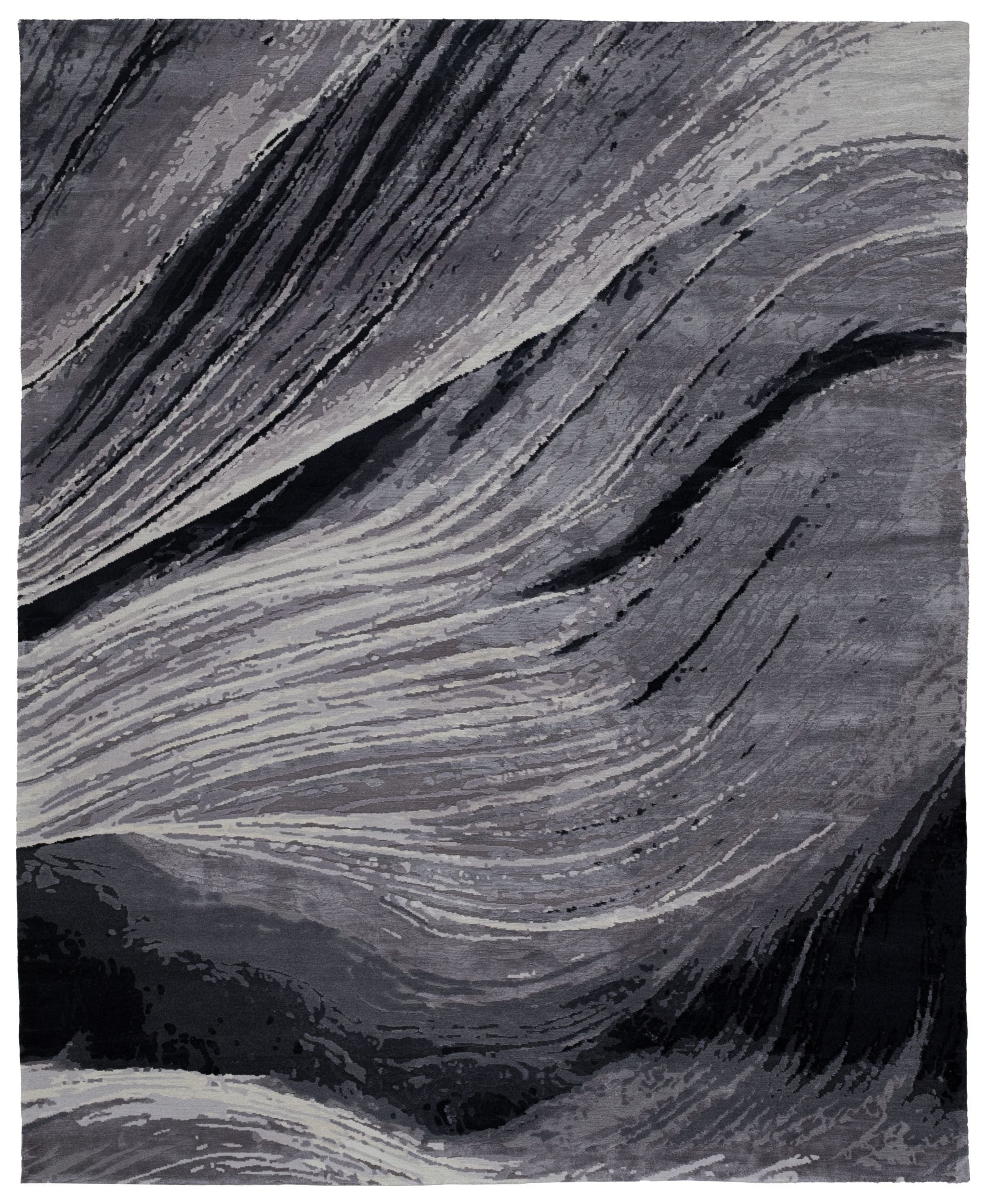 Full size black and grey abstract rug.