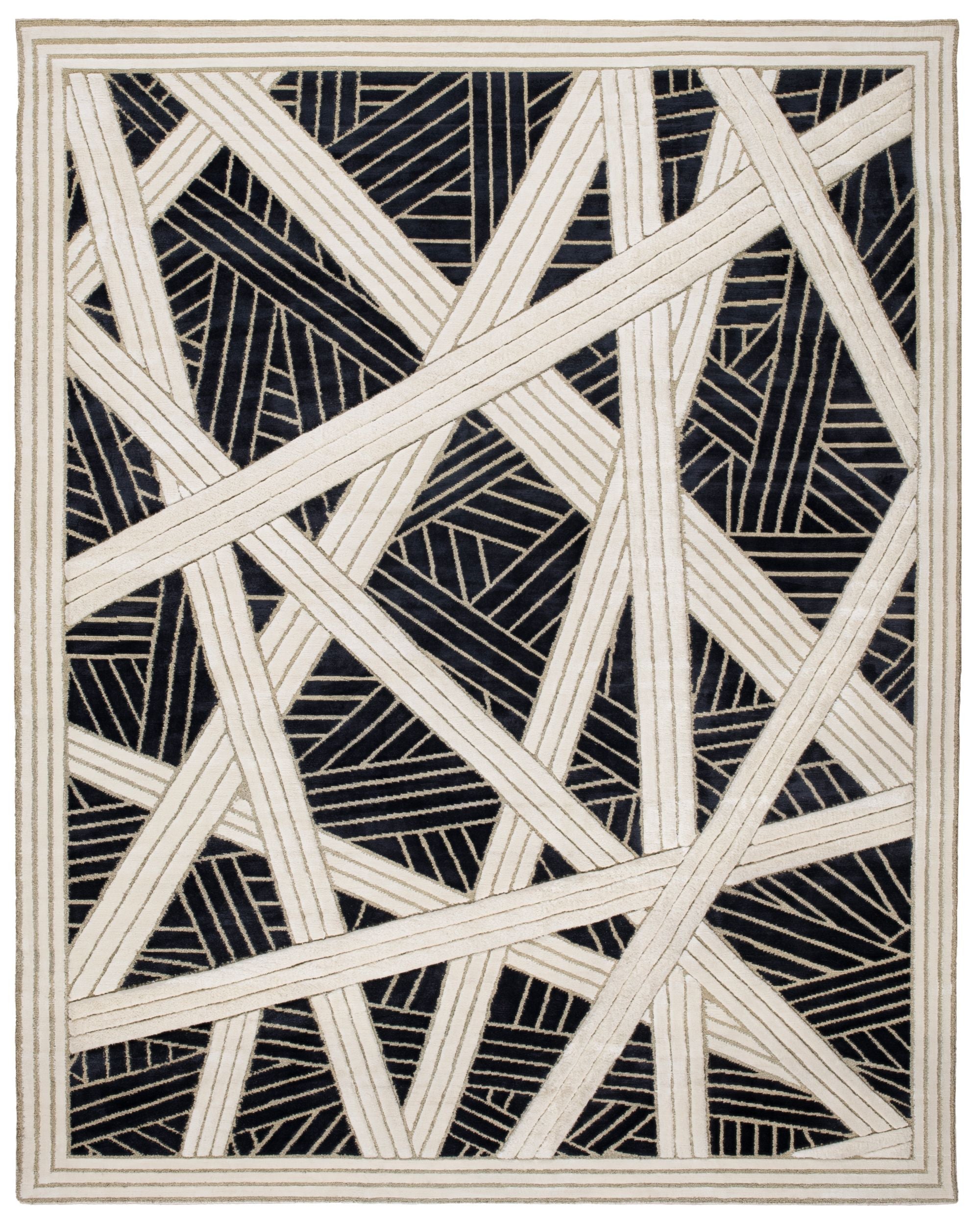 Black and white full size geometric designer rug.
