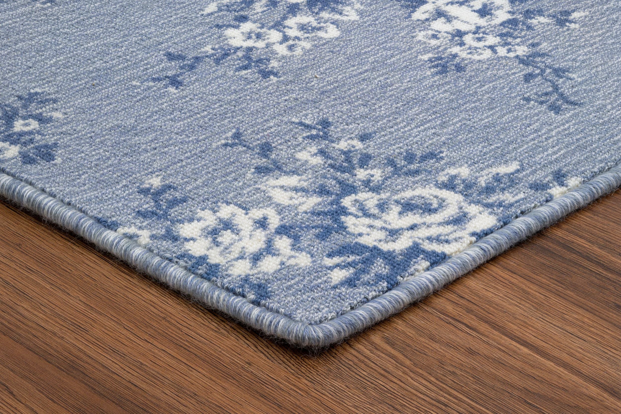 Rosales Design in Blue showing a corner of the gug